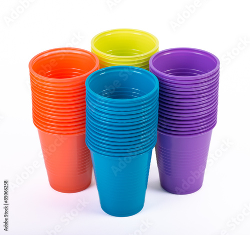 Plastic color coffee cups white background.