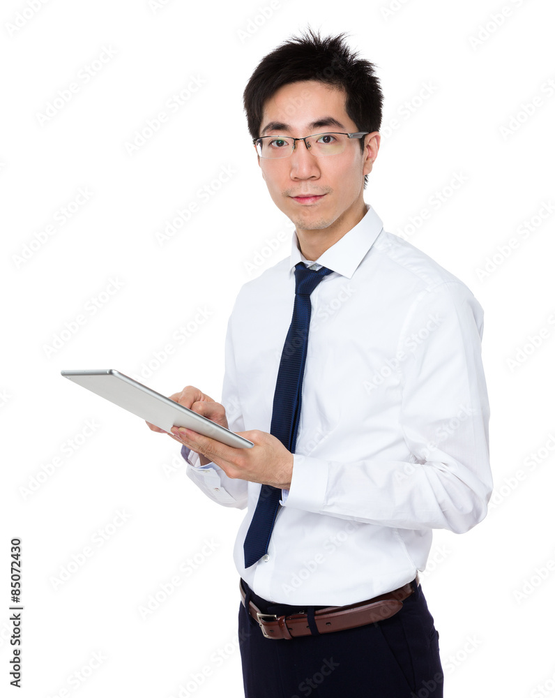 Young businessman use of tablet pc Young businessman use of tablet pc