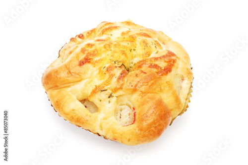 sweet bread on foil on white background