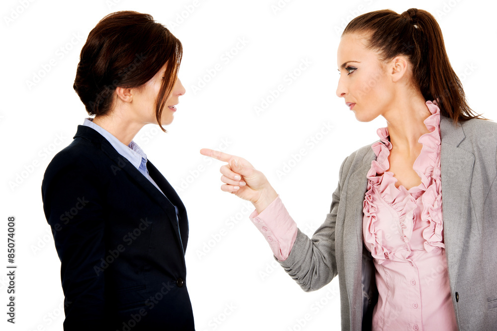 Angry businesswoman accuses her partner. Angry businesswoman accuses her partner.