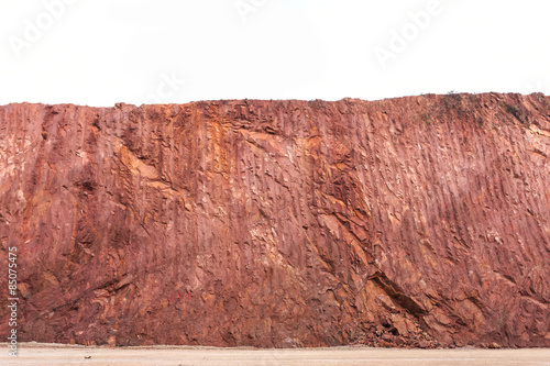 Texture of mountain showing red soil after excavated