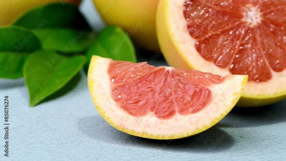 Ripe grapefruit close-up on wooden table background. Ripe grapefruit close-up on wooden table background.