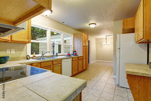 Authentic kitchen with tile floor.