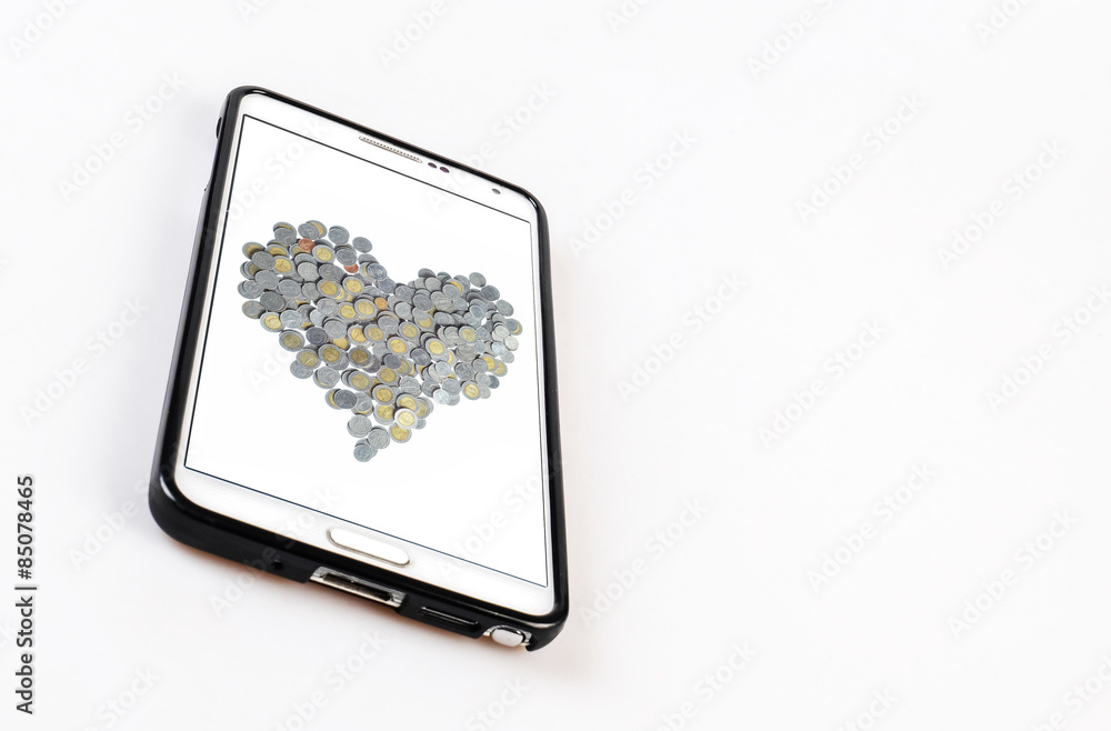 Obraz premium Smartphone with Heart coin shaped background and isolated on whi