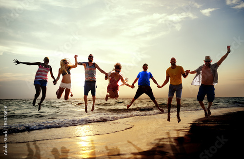 Diverse Beach Summer Friends Fun Jump Shot Concept