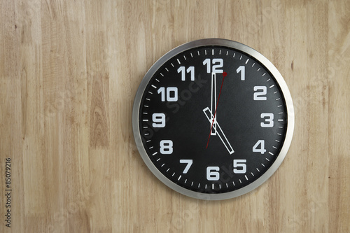 Standless Clock on Wooden Background, 5 O'Clock
