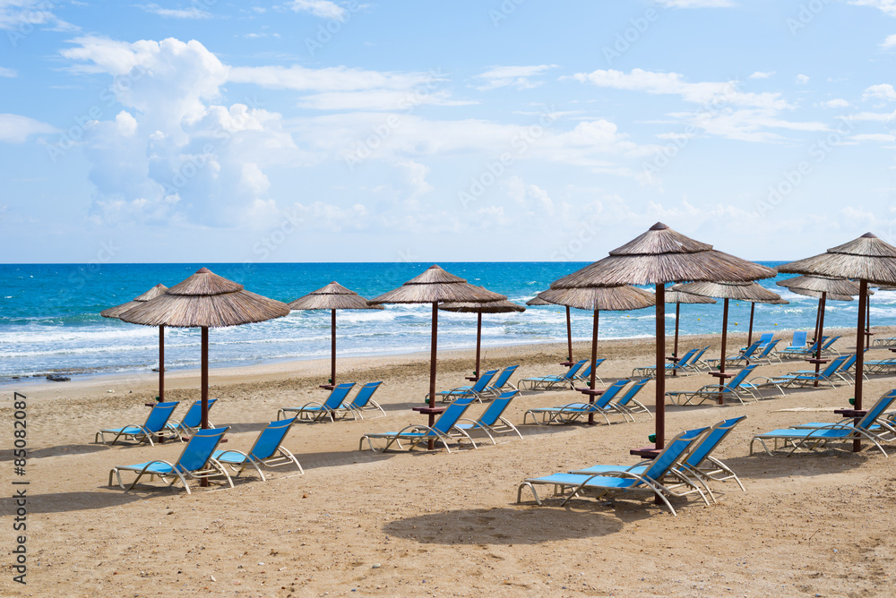 Empty sun chairs on the beach