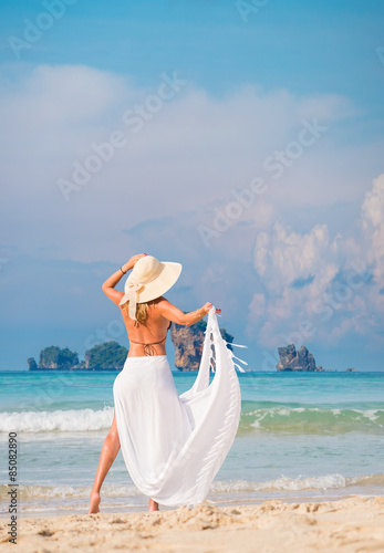 Beautiful woman on the beach. photo