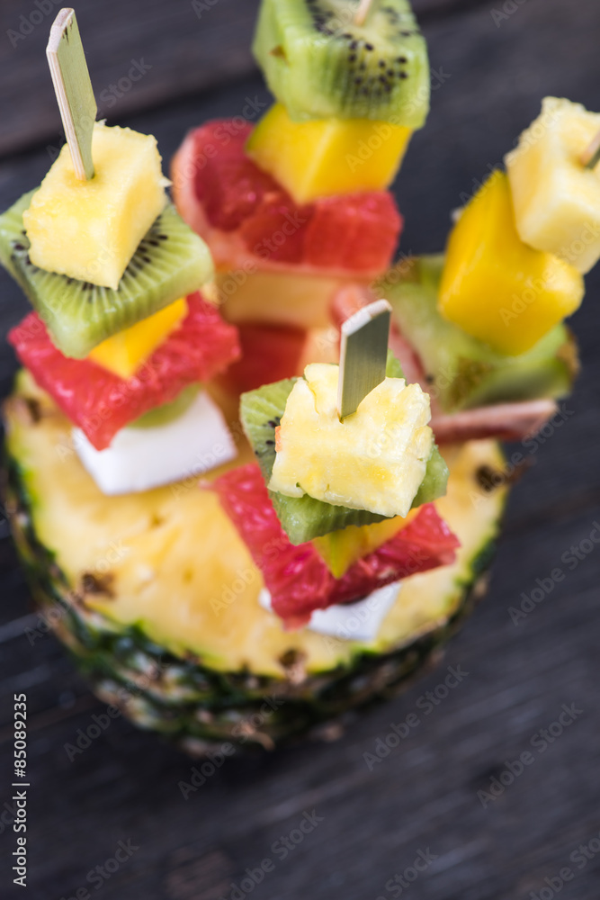 Healthy party snack, exotic fruits on skewers Healthy party snack, exotic fruits on skewers