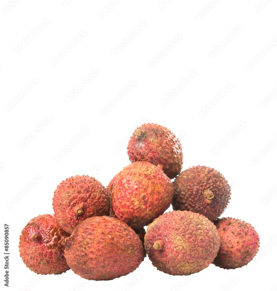 Ripe lychee fruits over white background Ripe lychee fruits over white background