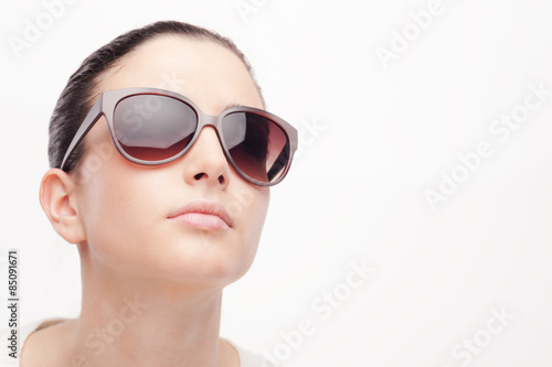 Young fashion model with sunglasses