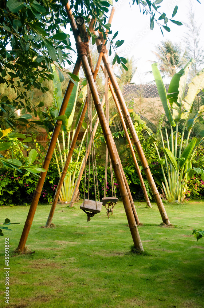 Fototapeta premium Green place with bamboo swings