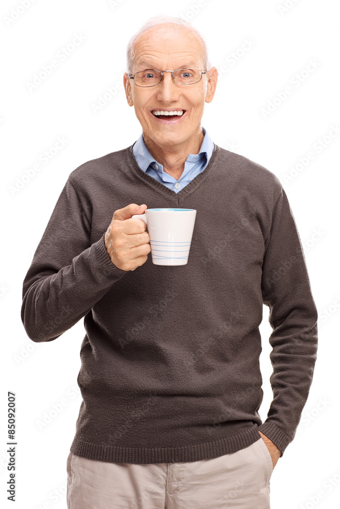 Joyful senior holding a white coffee cup Joyful senior holding a white coffee cup