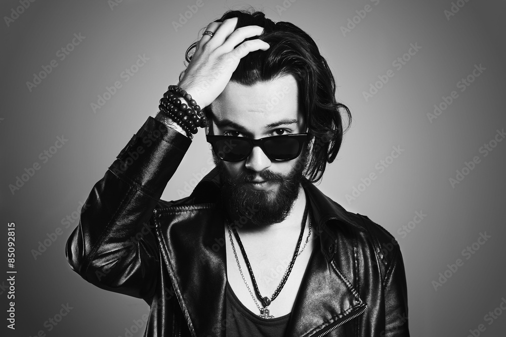 monochrome portrait of handsome man.bearded boy in sunglasses monochrome portrait of handsome man.bearded boy in sunglasses