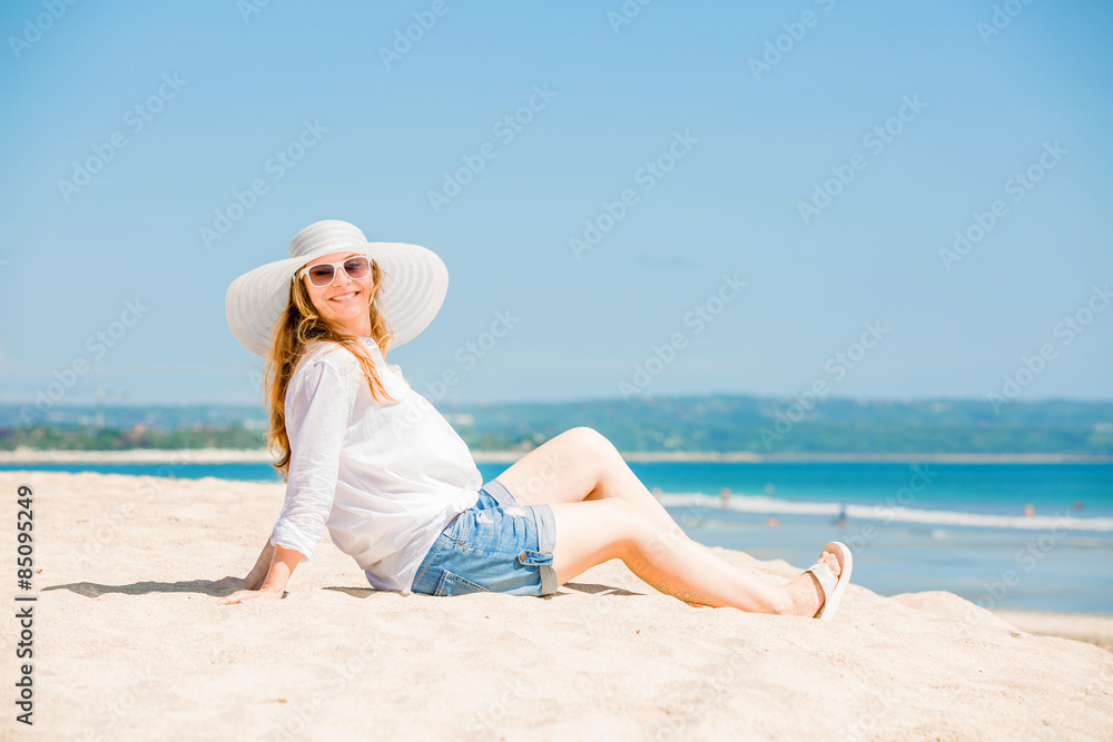 Beautifil young woman lying on the beach at sunny day enjoing Beautifil young woman lying on the beach at sunny day enjoing