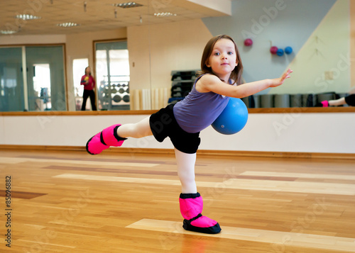 Child doing gymnastics