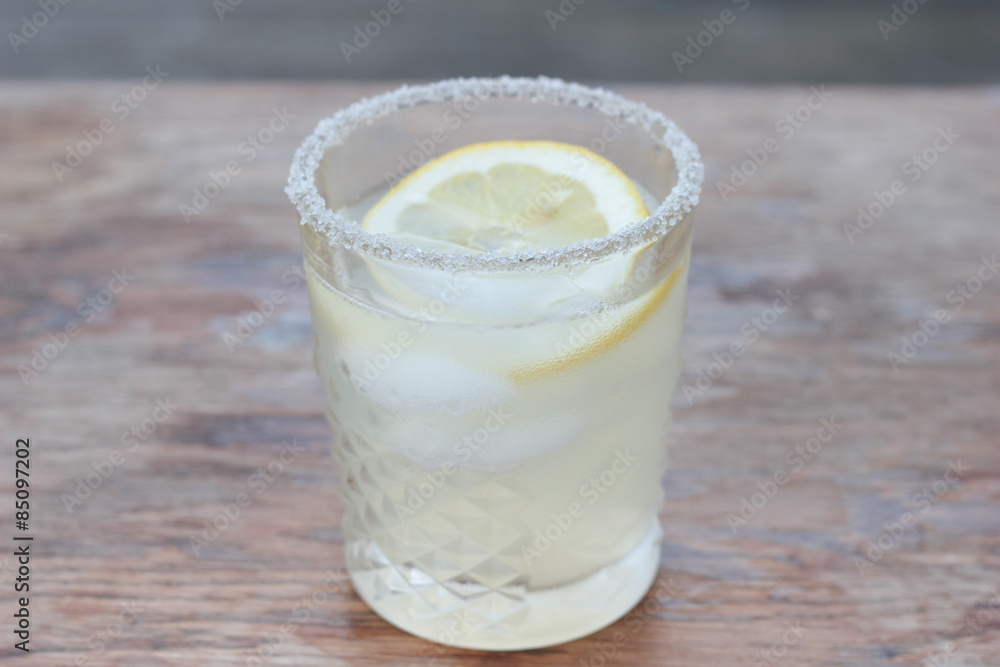 Glass of freshly prepared, cold and refreshing lemonade. Glass of freshly prepared, cold and refreshing lemonade.