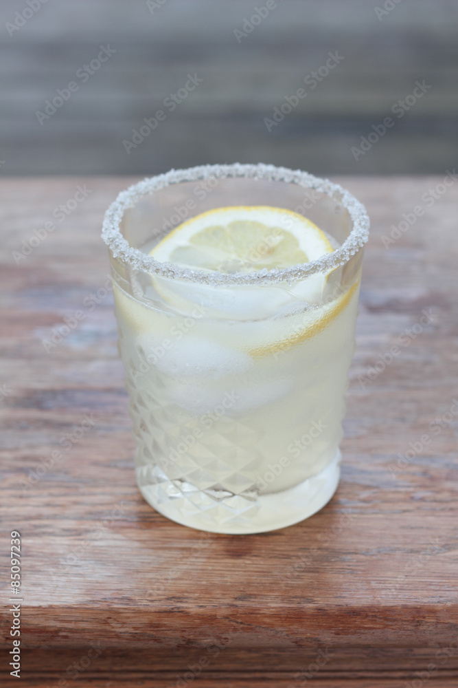 Glass of freshly prepared, cold and refreshing lemonade. Glass of freshly prepared, cold and refreshing lemonade.