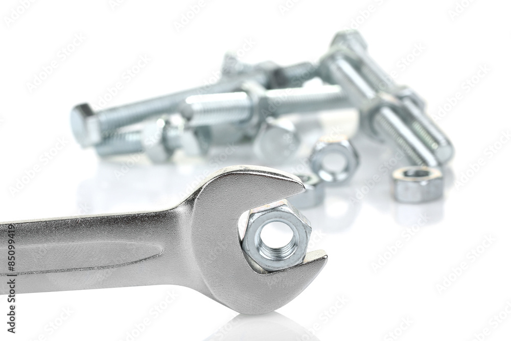 Working tools. The key, bolt and nut isolated Working tools. The key, bolt and nut isolated