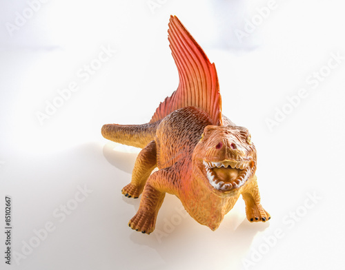 Dinosaur toy isolated on white © Greg Brave