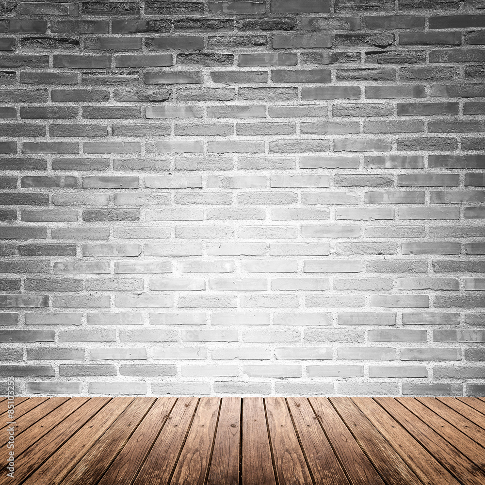 Fototapeta premium Old interior room with brick wall and wood floor