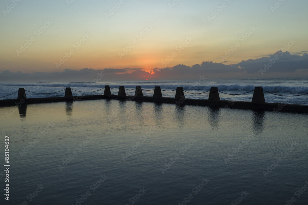 Tidal swimming pool ocean wave coastline dawn sunrise landscape