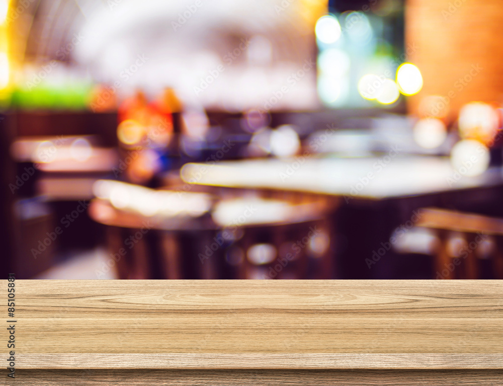 Empty wood table and blurred restaurant background. product disp