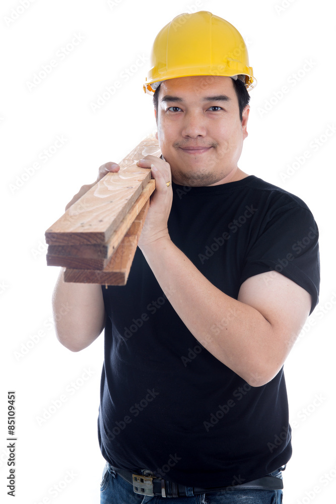 Portrait of asian smiling carpenter holding wood planks. Portrait of asian smiling carpenter holding wood planks.