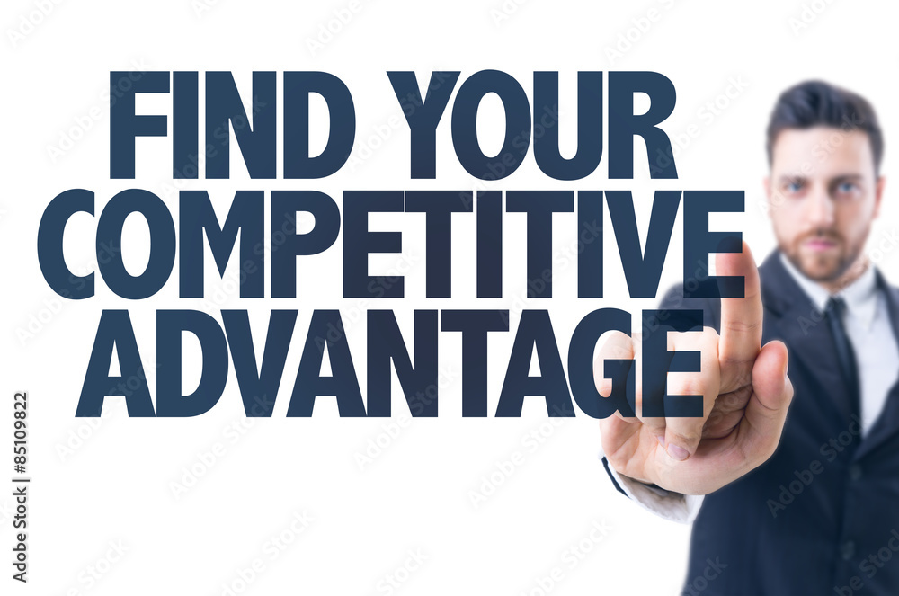 Business man pointing the text: Find Your Competitive Advantage