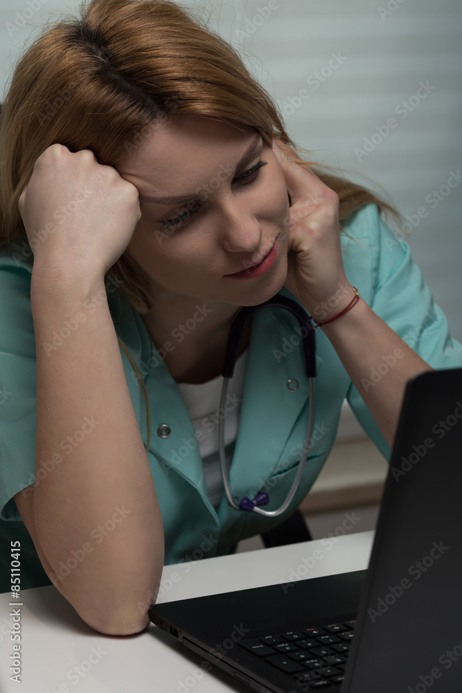 Medical student and her laptop Medical student and her laptop