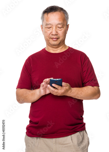 Asian man use of cellphone
