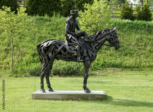 Steel sculpture of a horse and rider