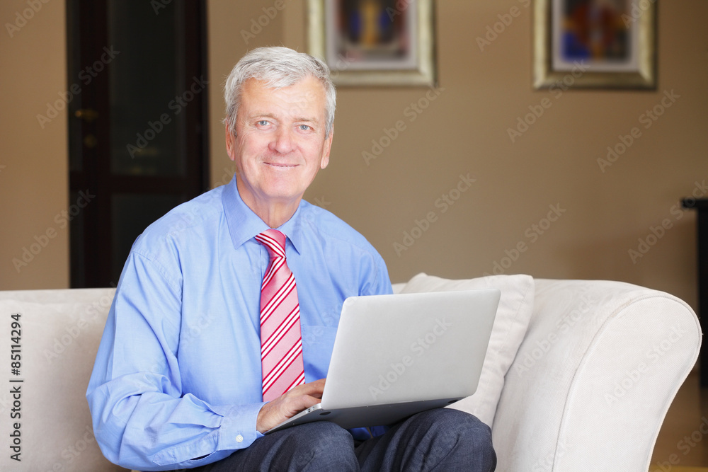 Senior man surfing on internet Senior man surfing on internet