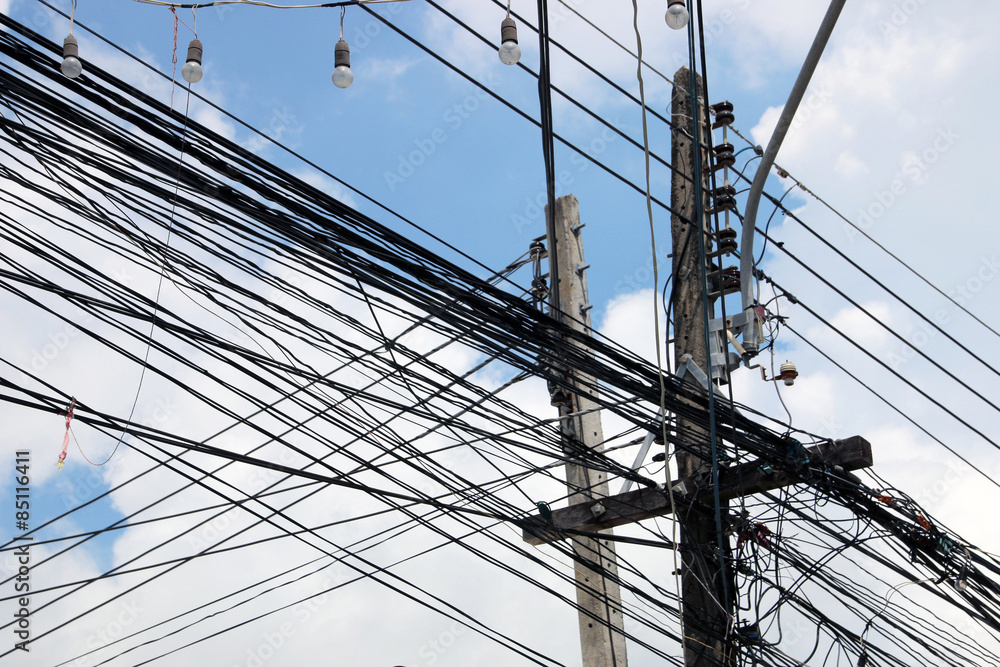 Strings of Cables Connected to Wooden Poles Strings of Cables Connected to Wooden Poles