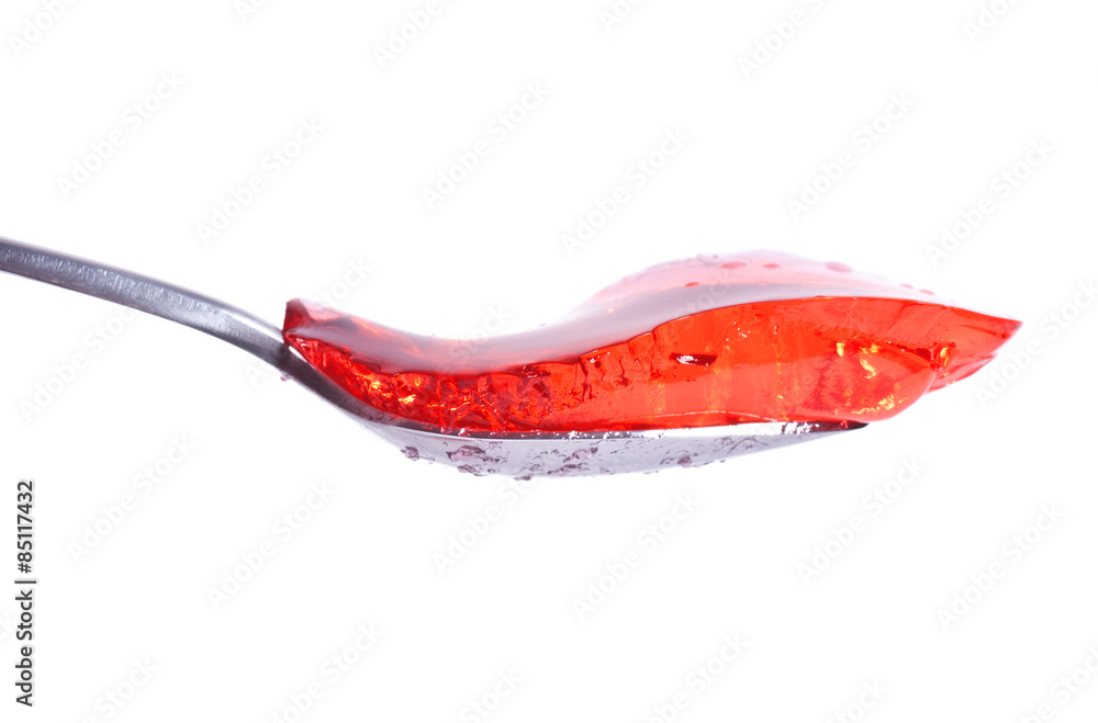 strawberry jelly on spoon