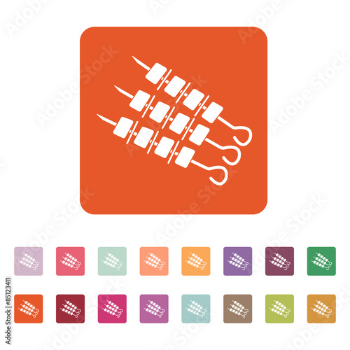 The shashlik icon. Kebab and barbecue symbol. Flat