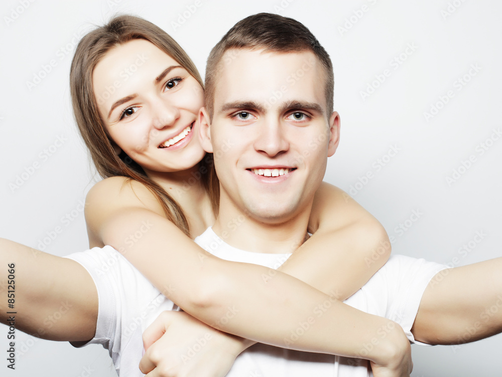 man taking a selfie with her girlfriend man taking a selfie with her girlfriend