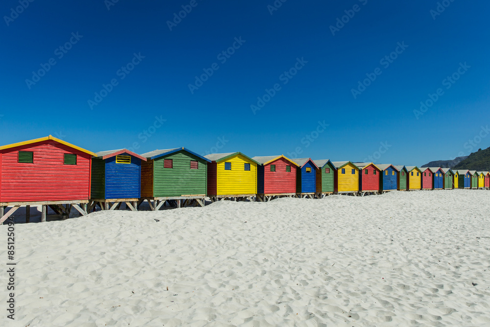 Obraz premium Colored Beach Houses in Muizenberg Cape Town, South Africa, beach, blue sky