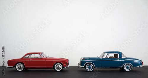 Red and Blue Classic Retro Luxury Sports Coupe Cars