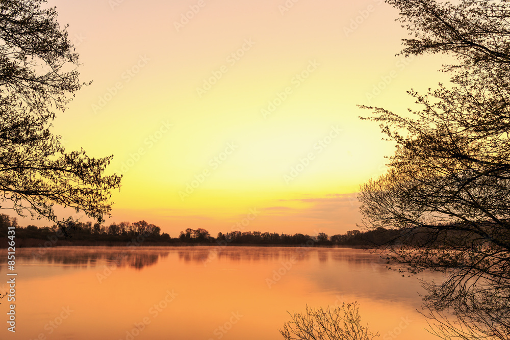Serene Sunrise at the Lake in Bavaria, Germany. Lovely warm spring morning Serene Sunrise at the Lake in Bavaria, Germany. Lovely warm spring morning