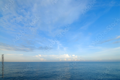 Horizon line between sky and sea water