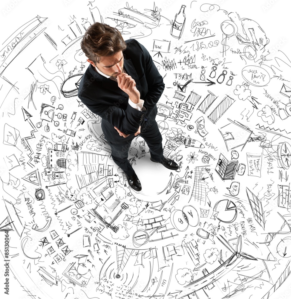 Businessman thinking projects Businessman thinking projects