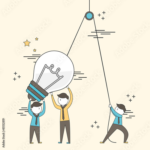 teamwork concept: businessmen setting up a big lighting bulb