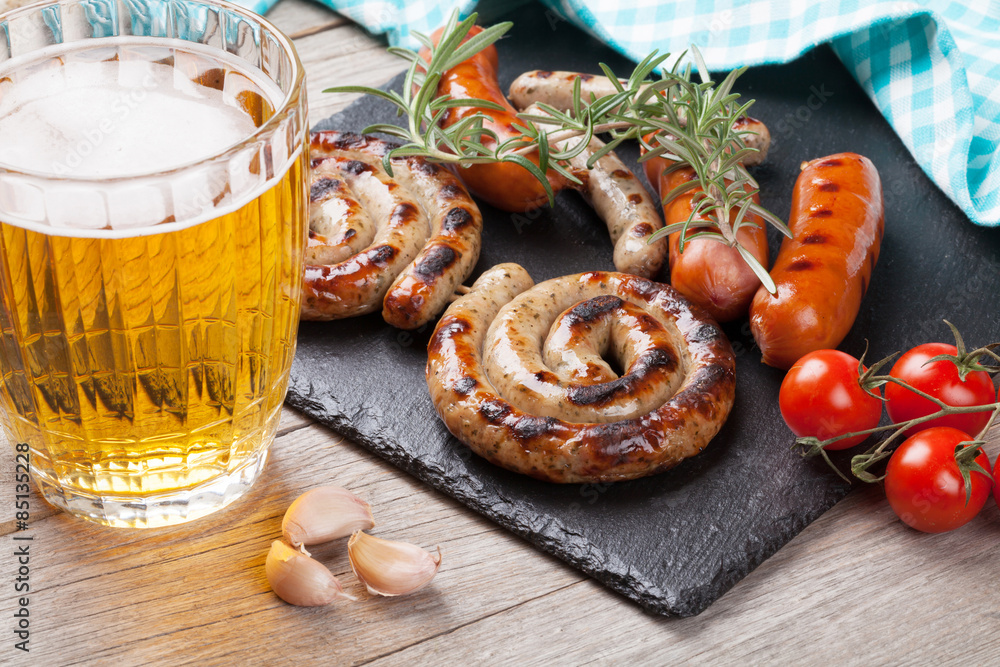 Beer mug and grilled sausages Beer mug and grilled sausages