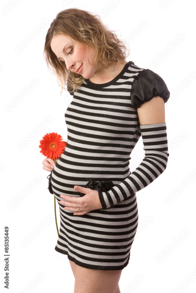 Young pregnant women with the red flower Young pregnant women with the red flower