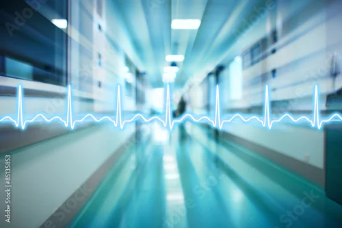 Obraz Linia EKG na tle korytarza szpitalnego medyka