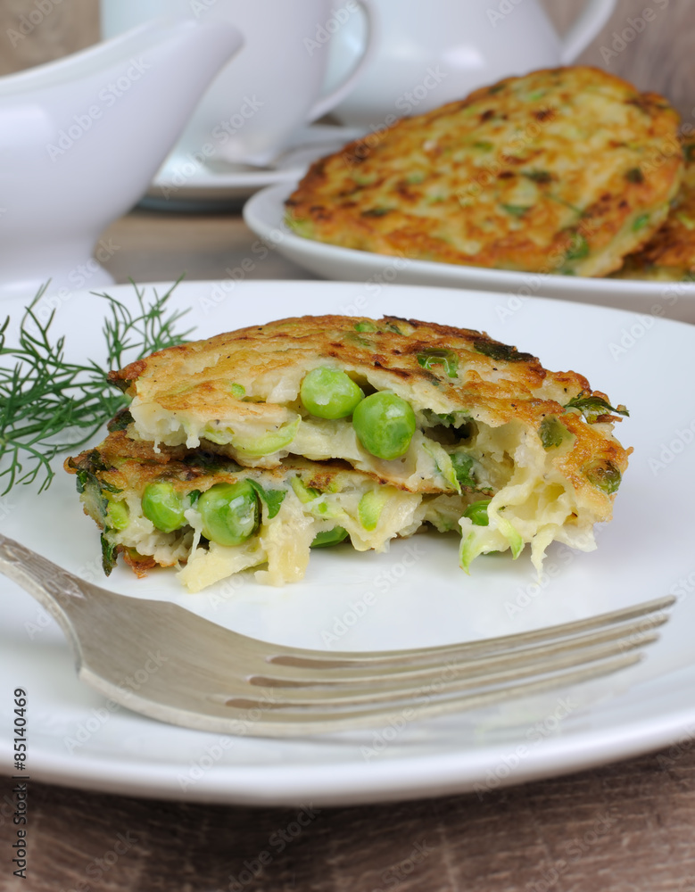 Fritters of zucchini and peas