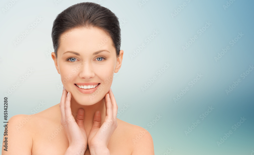 beautiful young woman touching her face and neck beautiful young woman touching her face and neck