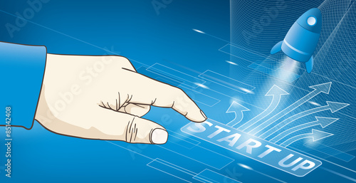 Hand pressing the start up button