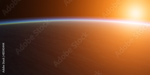 Blue planet with bright sun.